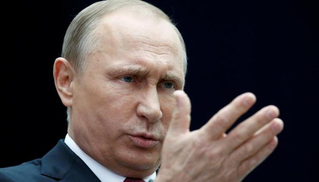 Russian President Vladimir Putin gestures as he speaks to journalists following a live nationwide broadcast call-in in Moscow, Russia. (Reuters Photo) Russian President Vladimir Putin gestures as he speaks to journalists following a live nationwide broadcast call-in in Moscow, Russia. (Reuters Photo)