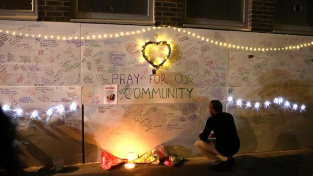 Messages of condolence on a wall near the tower block severely damaged by fire, in north Kensington, West London.(Reuters)