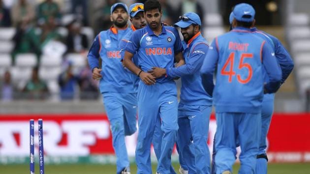India's Bhuvneshwar Kumar celebrates taking the wicket of Bangladesh's Soumya Sarkar. (REUTERS) 