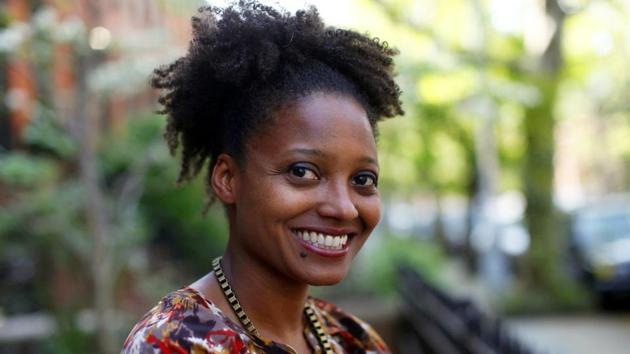Pulitzer Prize winning poet Tracy K Smith poses outside her apartment in New York. (Jason DeCrow/AP) Pulitzer Prize winning poet Tracy K Smith poses outside her apartment in New York. (Jason DeCrow/AP)