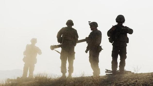 US soldiers from the 3rd Cavalry Regiment walk on a hill after finishing a training exercise near forward operating base Gamberi in Laghman province of Afghanistan in December 2014. (Reuters) US soldiers from the 3rd Cavalry Regiment walk on a hill after finishing a training exercise near forward operating base Gamberi in Laghman province of Afghanistan in December 2014. (Reuters)