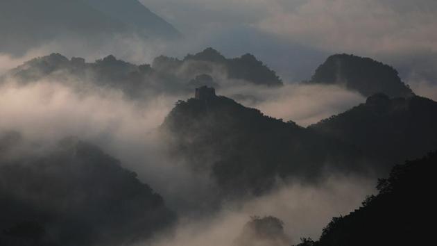 Early morning fog covers the Jiankou section of the Great Wall located in Huairou district north of Beijing. Constructed in 1368 during the period of Ming Dynasty, this section of Great Wall is a photographic hot spot. (Damir Sagolj/REUTERS) Early morning fog covers the Jiankou section of the Great Wall located in Huairou district north of Beijing. Constructed in 1368 during the period of Ming Dynasty, this section of Great Wall is a photographic hot spot. (Damir Sagolj/REUTERS)