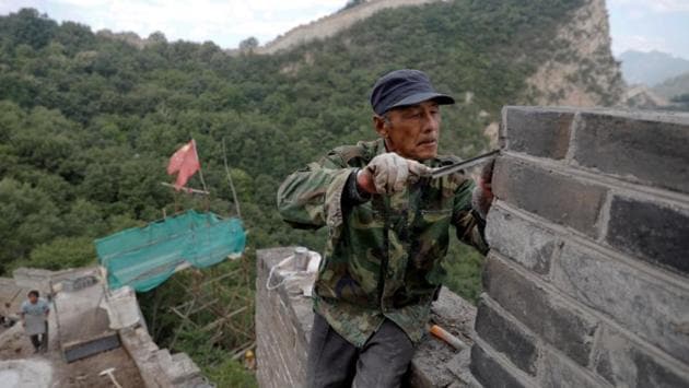 In order to preserve the historical and cultural aspect of the Great Wall, workers have used original bricks that broke off the wall over the centuries or made new bricks that matched the specifications. (Damir Sagolj/REUTERS) In order to preserve the historical and cultural aspect of the Great Wall, workers have used original bricks that broke off the wall over the centuries or made new bricks that matched the specifications. (Damir Sagolj/REUTERS)