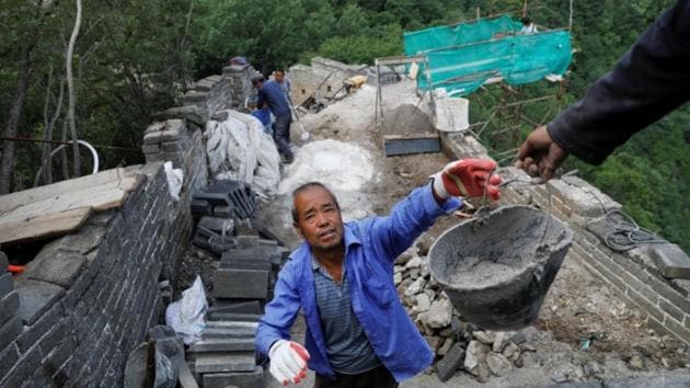 The authorities have been careful to develop a meticulous approach ever since a widespread outrage was sparked last year by botched restoration efforts on some stretches. (Damir Sagolj/REUTERS) The authorities have been careful to develop a meticulous approach ever since a widespread outrage was sparked last year by botched restoration efforts on some stretches. (Damir Sagolj/REUTERS)