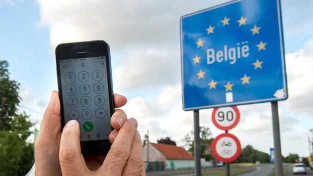 This file photo taken on June 06, 2017 shows a man using his mobile phone in Boeschepe at the Franco-Belgian border on June 6, 2017. On June 15, 2017, mobile roaming charges will be abolished in the countries of the European Union. (AFP Photo) This file photo taken on June 06, 2017 shows a man using his mobile phone in Boeschepe at the Franco-Belgian border on June 6, 2017. On June 15, 2017, mobile roaming charges will be abolished in the countries of the European Union. (AFP Photo)