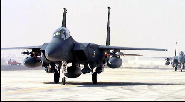 This file photo taken on February 20, 1997 shows US F-15 warplanes landing at a Qatari base in Doha 20 February. The United States agreed a major warplane sale to Qatar and began manoeuvres with the emirate's navy on June 15, 2017, underscoring its commitment to their military alliance despite Doha's rift with other Gulf allies. (AFP) This file photo taken on February 20, 1997 shows US F-15 warplanes landing at a Qatari base in Doha 20 February. The United States agreed a major warplane sale to Qatar and began manoeuvres with the emirate's navy on June 15, 2017, underscoring its commitment to their military alliance despite Doha's rift with other Gulf allies. (AFP)