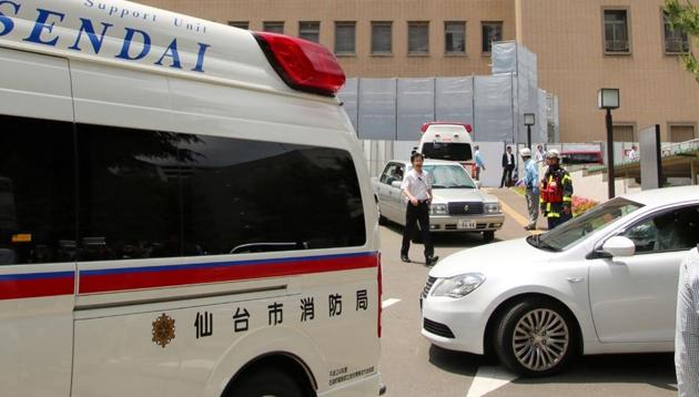 An ambulance and police cars at the Sendai district court where a man stabbed two court officers on Friday. (AFP) An ambulance and police cars at the Sendai district court where a man stabbed two court officers on Friday. (AFP)