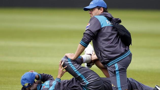 Mohammad Amir receives treatment from team physio during Pakistan’s practice session on Friday. (REUTERS) Mohammad Amir receives treatment from team physio during Pakistan’s practice session on Friday. (REUTERS)