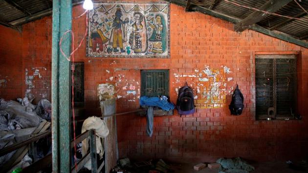 Rucksacks hang on the wall of the ticket office at Janakpur railway station. (Navesh Chitrakar / REUTERS)