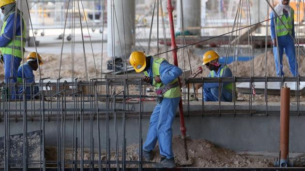 This file photo taken on October 03, 2013 shows migrant labourers working on a construction site on October 3, 2013 in Doha in Qatar. A diplomatic crisis in the Gulf has seen Qatar isolated after regional giant Saudi Arabia and several allied countries cut all ties to Doha. But outside the corridors of power, it is Qatar's foreign workforce - totalling more than two million, mostly from south Asia -- who are on the frontline when it comes to the immediate impact of the crisis. (AFP Photo) This file photo taken on October 03, 2013 shows migrant labourers working on a construction site on October 3, 2013 in Doha in Qatar. A diplomatic crisis in the Gulf has seen Qatar isolated after regional giant Saudi Arabia and several allied countries cut all ties to Doha. But outside the corridors of power, it is Qatar's foreign workforce - totalling more than two million, mostly from south Asia -- who are on the frontline when it comes to the immediate impact of the crisis. (AFP Photo)