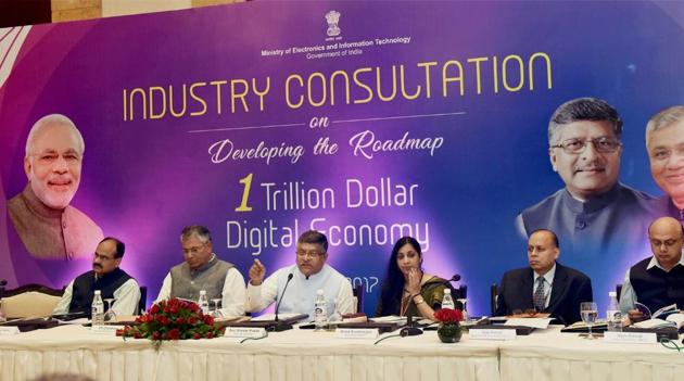 Union Minister for Electronics & Information Technology and Law & Justice, Ravi Shankar Prasad chairing a high level Round Table with Pioneers of Industry for developing the roadmap for one Trillion Dollar Digital Economy of India, organised by MEITY, in New Delhi on Friday. (PTI Photo) Union Minister for Electronics & Information Technology and Law & Justice, Ravi Shankar Prasad chairing a high level Round Table with Pioneers of Industry for developing the roadmap for one Trillion Dollar Digital Economy of India, organised by MEITY, in New Delhi on Friday. (PTI Photo)