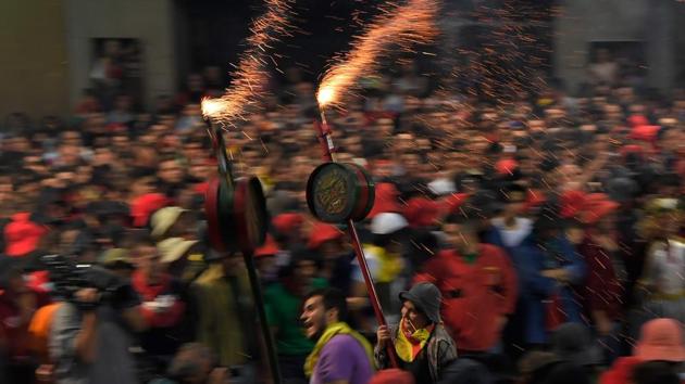 Dragons, giants, dwarfs and mules parade through the streets and main town square of Berga for the annual festival of La Patum, a celebration that has evolved over centuries that essentially celebrates the defiance of a community refusing to change. (LLUIS GENE / AFP) Dragons, giants, dwarfs and mules parade through the streets and main town square of Berga for the annual festival of La Patum, a celebration that has evolved over centuries that essentially celebrates the defiance of a community refusing to change. (LLUIS GENE / AFP)