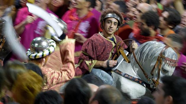 The earliest recorded performances of this kind date back to 1454, has kept the cultural and religious celebration alive in this form. (LLUIS GENE / AFP) The earliest recorded performances of this kind date back to 1454, has kept the cultural and religious celebration alive in this form. (LLUIS GENE / AFP)