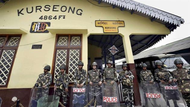 CRPF jawans standing guard during a strike called by the Gorkha Janamukti Morcha in Kurseong, Darjeeling on Friday. (PTI Photo) CRPF jawans standing guard during a strike called by the Gorkha Janamukti Morcha in Kurseong, Darjeeling on Friday. (PTI Photo)
