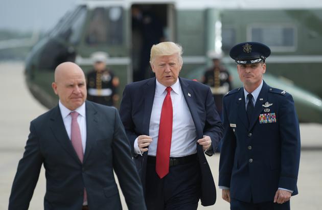 Donald Trump and national security advisor HR McMaster board Air Force One at Andrews Air Force Base. (AFP) Donald Trump and national security advisor HR McMaster board Air Force One at Andrews Air Force Base. (AFP)