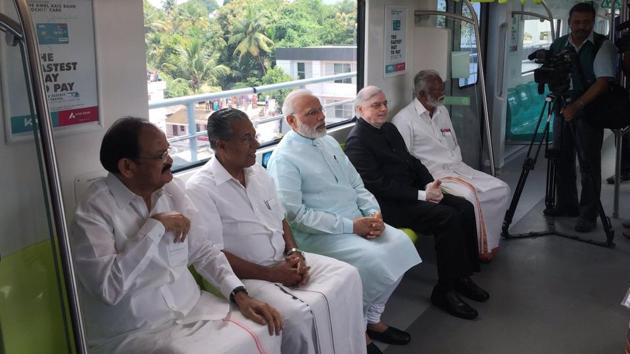 Prime Minister Narendra Modi, Union minister Venkaiah Naidu, Governor P Sathasivam and CM Pinarayi Vijayan take a ride on the first Kochi Metro train on Saturday. (Photo: PMO India) Prime Minister Narendra Modi, Union minister Venkaiah Naidu, Governor P Sathasivam and CM Pinarayi Vijayan take a ride on the first Kochi Metro train on Saturday. (Photo: PMO India)