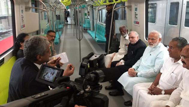 Soon after his arrival at the Naval airport from New Delhi, Modi drove to the Palarivattom station and took a ride from Palarivattom to Pathadippalam. (Twitter/ PMO India) Soon after his arrival at the Naval airport from New Delhi, Modi drove to the Palarivattom station and took a ride from Palarivattom to Pathadippalam. (Twitter/ PMO India)
