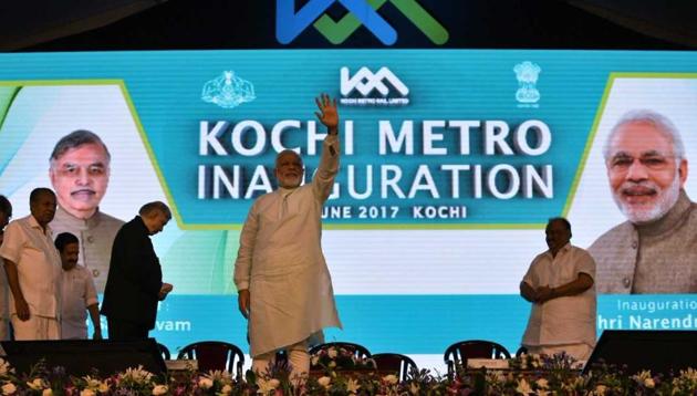 Prime Minister Narendra Modi waves to the crowd after inaugurating the first phase of Kochi Metro on Saturday.(PIB India)