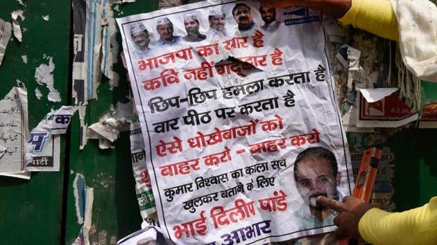 The posters accuse Vishwas of being a ‘traitor’ and indulging in anti-party activities. It also accuses him of colluding with the BJP and backstabbing party leaders. (Mohd Zakir/ HT Photo) The posters accuse Vishwas of being a ‘traitor’ and indulging in anti-party activities. It also accuses him of colluding with the BJP and backstabbing party leaders. (Mohd Zakir/ HT Photo)
