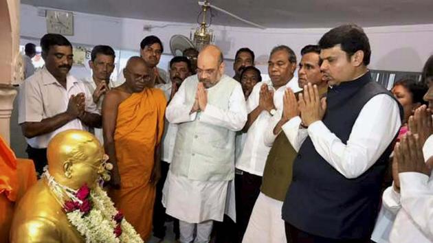 BJP president Amit Shah and Maharashtra CM Devendra Fadnavis pay tribute to Dr BR Ambedkar in Mumbai. (PTI Photo) BJP president Amit Shah and Maharashtra CM Devendra Fadnavis pay tribute to Dr BR Ambedkar in Mumbai. (PTI Photo)