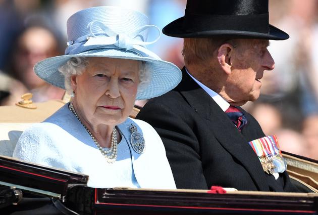Queen Elizabeth II and Prince Philip travel in a horse-drawn carriage on their way to the Queen's birthday parade. (AFP) Queen Elizabeth II and Prince Philip travel in a horse-drawn carriage on their way to the Queen's birthday parade. (AFP)