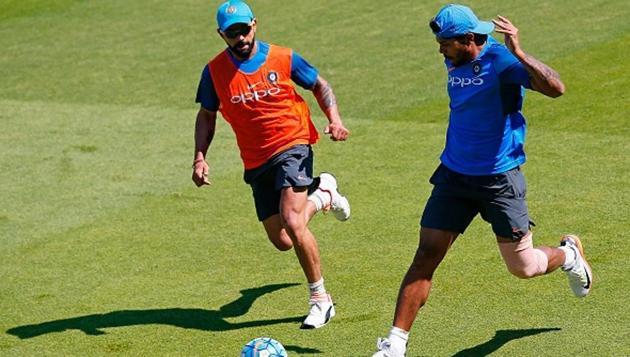 Virat Kohli (L) and Umesh Yadav play football on the eve of the ICC Champions Trophy Final. (AFP/Getty Images) Virat Kohli (L) and Umesh Yadav play football on the eve of the ICC Champions Trophy Final. (AFP/Getty Images)