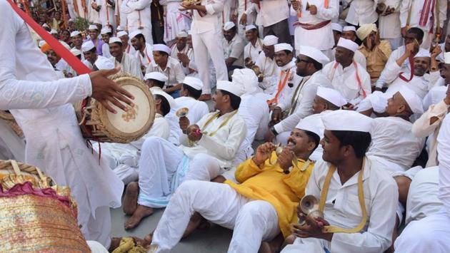 Devotees sing bhajans on their way. (HT PHOTO)