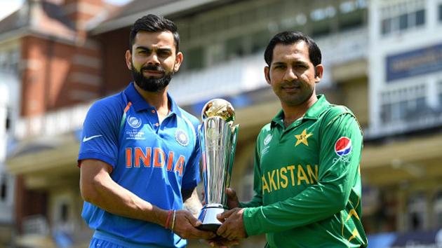Virat Kohli and Sarfraz Ahmed pose with the ICC Champions Trophy ahead of India vs Pakistan final at The Oval on Sunday. (Getty Images) Virat Kohli and Sarfraz Ahmed pose with the ICC Champions Trophy ahead of India vs Pakistan final at The Oval on Sunday. (Getty Images)