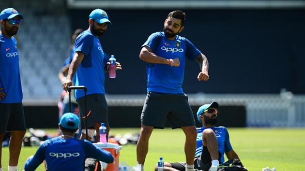 Virat Kohli jokes with teammates during India’s practice session on Saturday. (IDI via Getty Images) Virat Kohli jokes with teammates during India’s practice session on Saturday. (IDI via Getty Images)