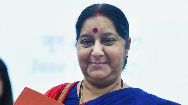 New Delhi: External affairs minister Sushma Swaraj releases a book during the inauguration of "Know India" programme portal and announcement of 2nd phase of post office Passport Seva Kendras, in New Delhi on Saturday.(PTI)