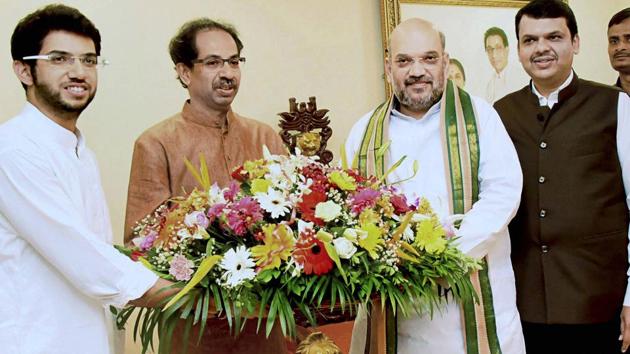 BJP president Amit Shah along with Maharashtra chief minister Devendra Fadnavis meets Shiv Sena chief Uddhav Thackeray and his son Aditya Thackeray at Matoshree in Mumbai on Sunday.(PTI Photo)