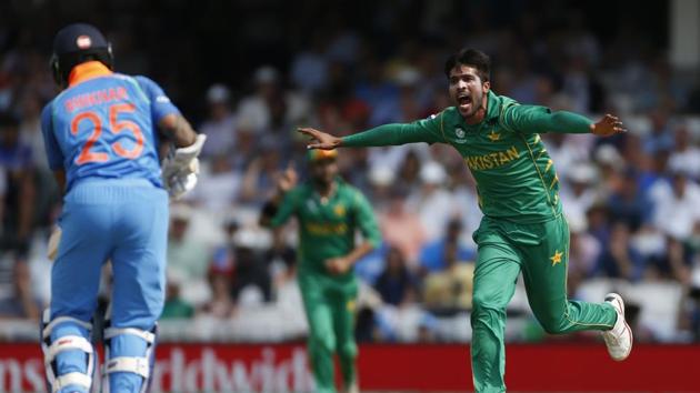 Amir picked up his third wicket as Shikhar Dhawan, the leading run-getter in this edition fell for 21. (REUTERS) Amir picked up his third wicket as Shikhar Dhawan, the leading run-getter in this edition fell for 21. (REUTERS)