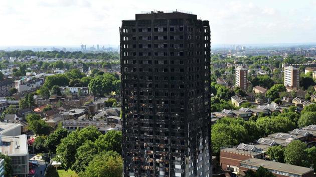 The remains of Grenfell Tower, a residential tower block in west London which was gutted by fire, are pictured against the London skyline. The toll from the London tower block fire has risen to at least 30 people dead and the flames have now been extinguished, police said on June 16, 2017. (Chris J Ratcliffe/AFP) The remains of Grenfell Tower, a residential tower block in west London which was gutted by fire, are pictured against the London skyline. The toll from the London tower block fire has risen to at least 30 people dead and the flames have now been extinguished, police said on June 16, 2017. (Chris J Ratcliffe/AFP)