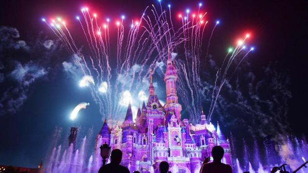 Visitors watch fireworks exploding over the castle at an event to mark the first anniversary of the opening of Shanghai Disneyland, in Shanghai. (AFP) Visitors watch fireworks exploding over the castle at an event to mark the first anniversary of the opening of Shanghai Disneyland, in Shanghai. (AFP)