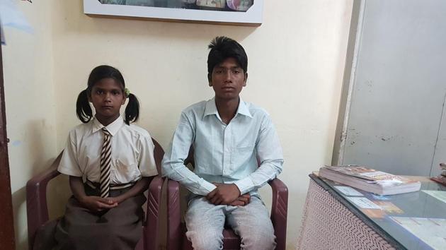 Suraj Banjara (17) with his sister Saloni (9). (HT Photo) Suraj Banjara (17) with his sister Saloni (9). (HT Photo)