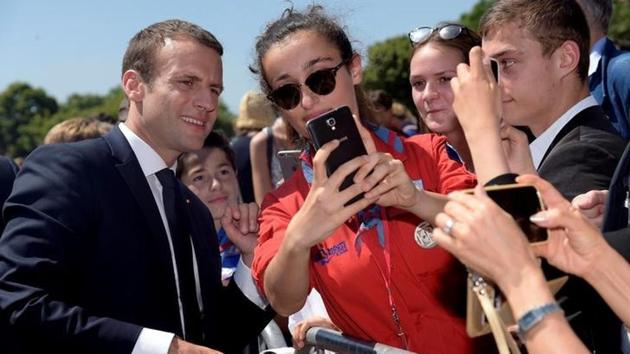 French President Emmanuel Macron (L) attends a ceremony marking the 77th anniversary of late French General Charles de Gaulle's resistance call of June 18, 1940, at the Mont Valerien memorial in Suresnes, near Paris, France, June 18, 2017.(Reuters) French President Emmanuel Macron (L) attends a ceremony marking the 77th anniversary of late French General Charles de Gaulle's resistance call of June 18, 1940, at the Mont Valerien memorial in Suresnes, near Paris, France, June 18, 2017.(Reuters)