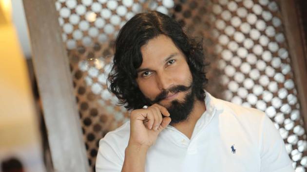 Randeep Hooda poses during an interview with Hindustan Times after launching Gym 99.(Hindustan Times)
