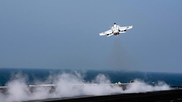US Navy photo from October 2016 shows an F-18E Super Hornet launching from the flight deck of the aircraft carrier USS Dwight D Eisenhower in the Gulf. A US F/A-18E Super Hornet shot down a Syrian regime plane on June 18, 2017, after it dropped bombs on US-backed forces fighting the Islamic State group in northern Syria. (AFP) US Navy photo from October 2016 shows an F-18E Super Hornet launching from the flight deck of the aircraft carrier USS Dwight D Eisenhower in the Gulf. A US F/A-18E Super Hornet shot down a Syrian regime plane on June 18, 2017, after it dropped bombs on US-backed forces fighting the Islamic State group in northern Syria. (AFP)
