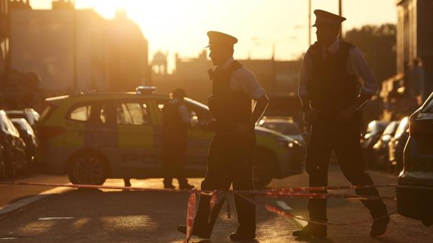 Daybreak at the scene of the incident near the mosque with police officers standing on duty. (REUTERS) Daybreak at the scene of the incident near the mosque with police officers standing on duty. (REUTERS)