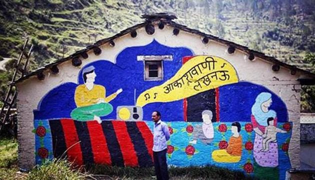 One of the art works on the wall of an abandoned house in Saur village in Tehri.(HT Photo)