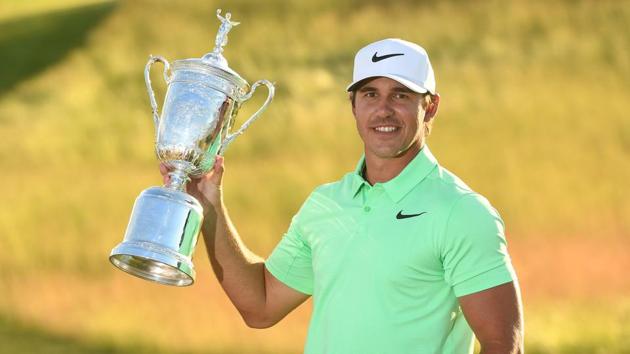 Brooks Koepka poses with the trophy after winning the U.S. Open golf tournament at Erin Hills.(Rob Schumacher/USA Today Sports)