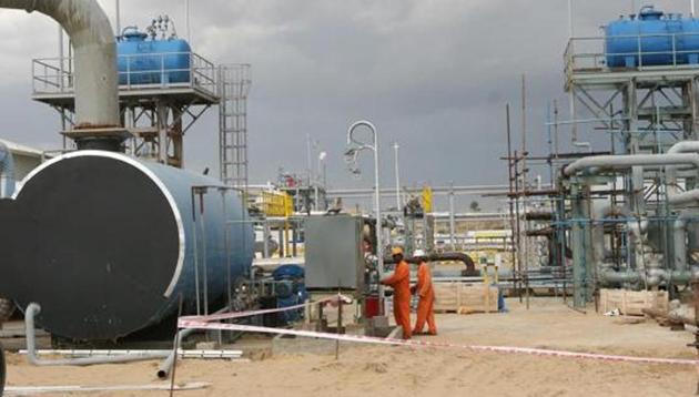 File photo of Cairn India (now Vedanta)employees work at a storage facility for crude oil at Mangala oil field at Barmer in the desert Indian state of Rajasthan. (Hindustan Times) File photo of Cairn India (now Vedanta)employees work at a storage facility for crude oil at Mangala oil field at Barmer in the desert Indian state of Rajasthan. (Hindustan Times)