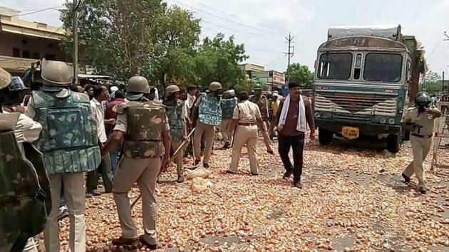 Farmers throw onions on the road during their protest in Shajapur of Madhya Pradesh. (PTI File Photo) Farmers throw onions on the road during their protest in Shajapur of Madhya Pradesh. (PTI File Photo)