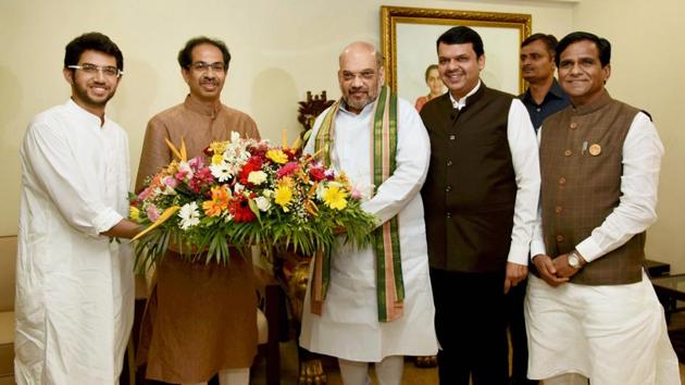 BJP National President Amit Shah accompanied by Maharashtra CM Devendra Fadnavis and State BJP chief Raosaheb Danve greet Shiv Sena President Uddhav Thackeray and his son Aditya at Matoshree on Sunday. (PTI) BJP National President Amit Shah accompanied by Maharashtra CM Devendra Fadnavis and State BJP chief Raosaheb Danve greet Shiv Sena President Uddhav Thackeray and his son Aditya at Matoshree on Sunday. (PTI)