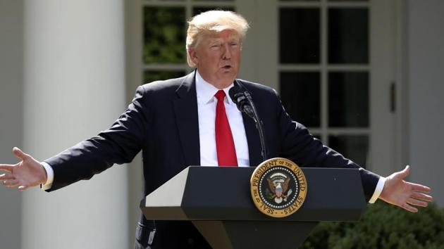 In this June 1 photo, President Donald Trump speaks about the US role in the Paris climate change accord in the Rose Garden of the White House in Washington.(AP)