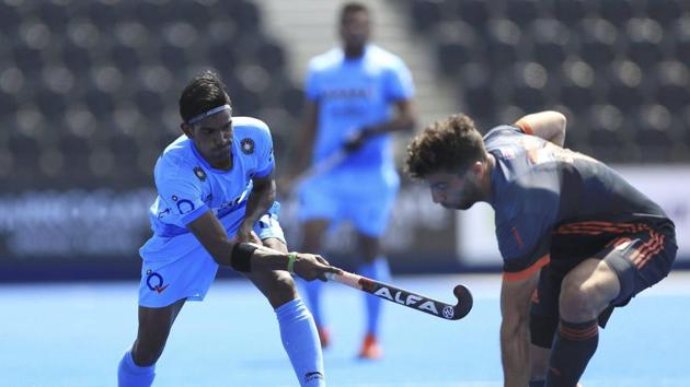 India's Sumit and Netherlands' Valentin Verga battle for the ball during the Men's World Hockey League match. Catch highlights of the match here. (AP) India's Sumit and Netherlands' Valentin Verga battle for the ball during the Men's World Hockey League match. Catch highlights of the match here. (AP)