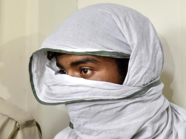 The arrested auto driver was produced before a court on Tuesday and remanded in judicial custody for 14 days. (Sanjeev Verma/HT PHOTO) The arrested auto driver was produced before a court on Tuesday and remanded in judicial custody for 14 days. (Sanjeev Verma/HT PHOTO)