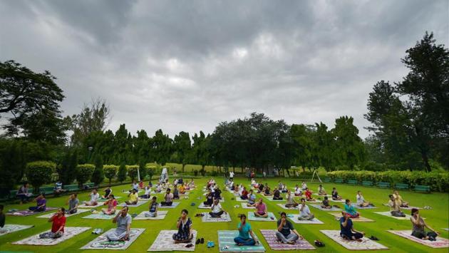 Yoga enthusiasts take part in a Yoga training session at Nehru park, a day before the International Day of Yoga in New Delhi on June 20, 2017. (Vijay Verma/PTI) Yoga enthusiasts take part in a Yoga training session at Nehru park, a day before the International Day of Yoga in New Delhi on June 20, 2017. (Vijay Verma/PTI)