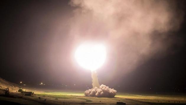 In this picture released by the Iranian state-run IRIB News Agency on Monday, a missile is fired from city of Kermanshah in western Iran targeting the Islamic State group in Syria (AP) In this picture released by the Iranian state-run IRIB News Agency on Monday, a missile is fired from city of Kermanshah in western Iran targeting the Islamic State group in Syria (AP)