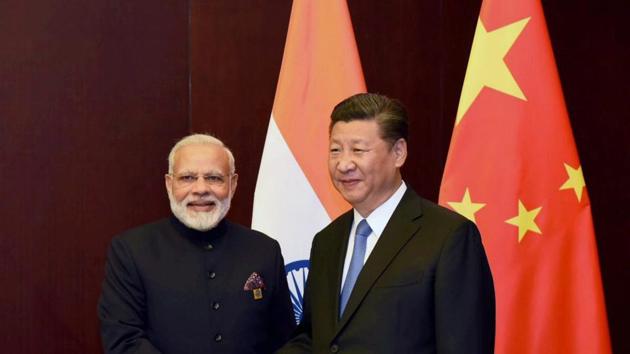 File photo of Prime Minister Narendra Modi and Chinese President Xi Jinping on the sidelines of the SCO Summit in Astana, Kazakhstan.(PTI) File photo of Prime Minister Narendra Modi and Chinese President Xi Jinping on the sidelines of the SCO Summit in Astana, Kazakhstan.(PTI)